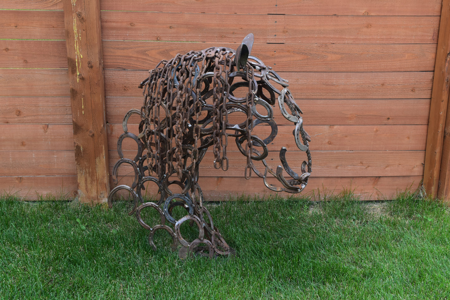 Authentic horseshoes repurposed into a 3D Horse Head Silhouette - Rustic original finish