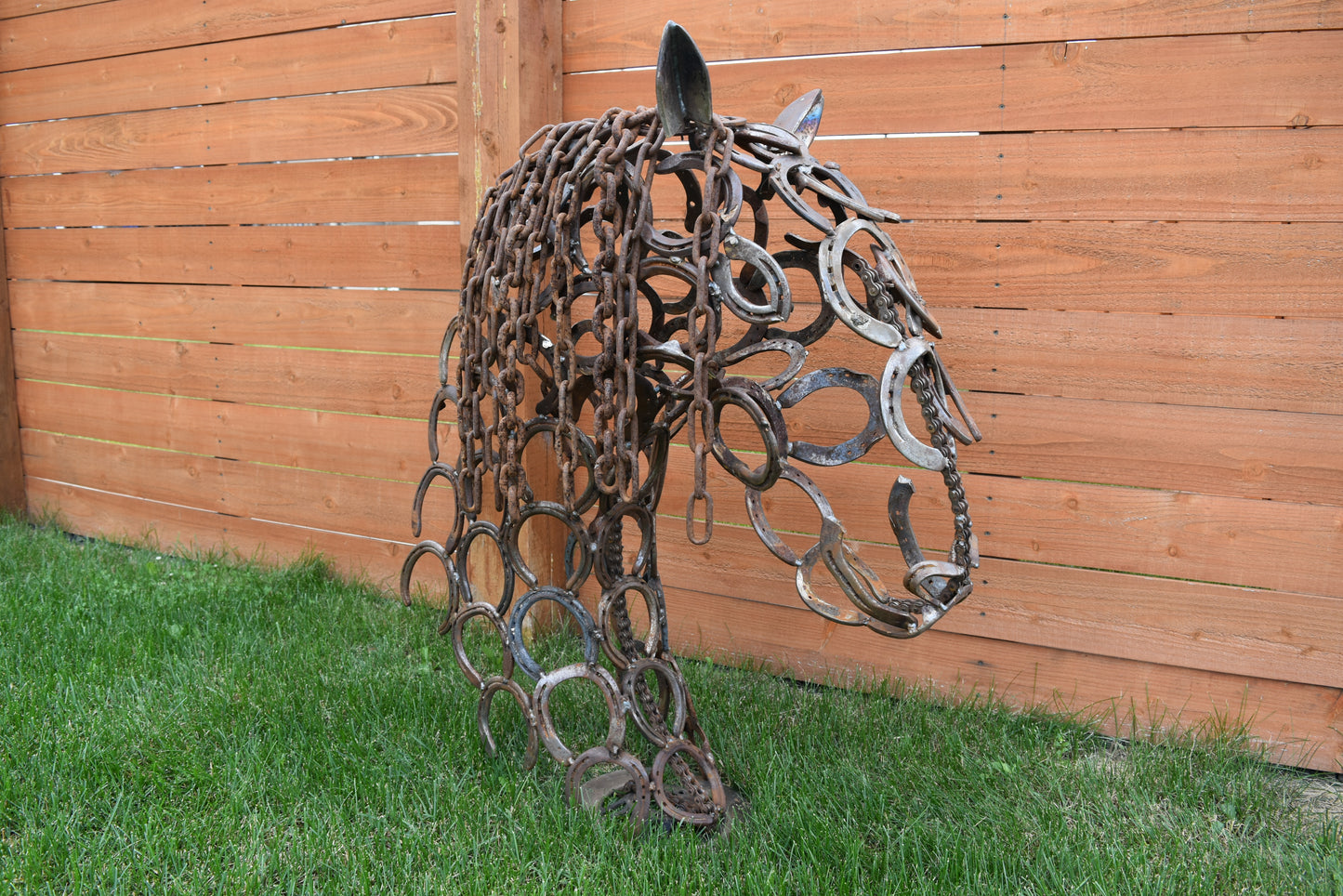 Authentic horseshoes repurposed into a 3D Horse Head Silhouette - Rustic original finish