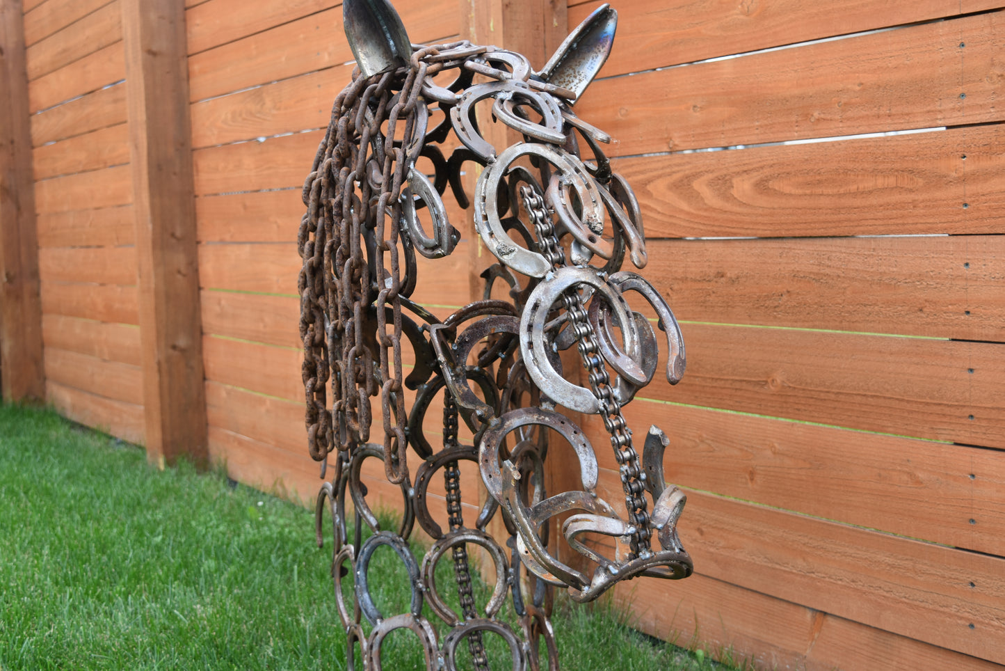 Authentic horseshoes repurposed into a 3D Horse Head Silhouette - Rustic original finish