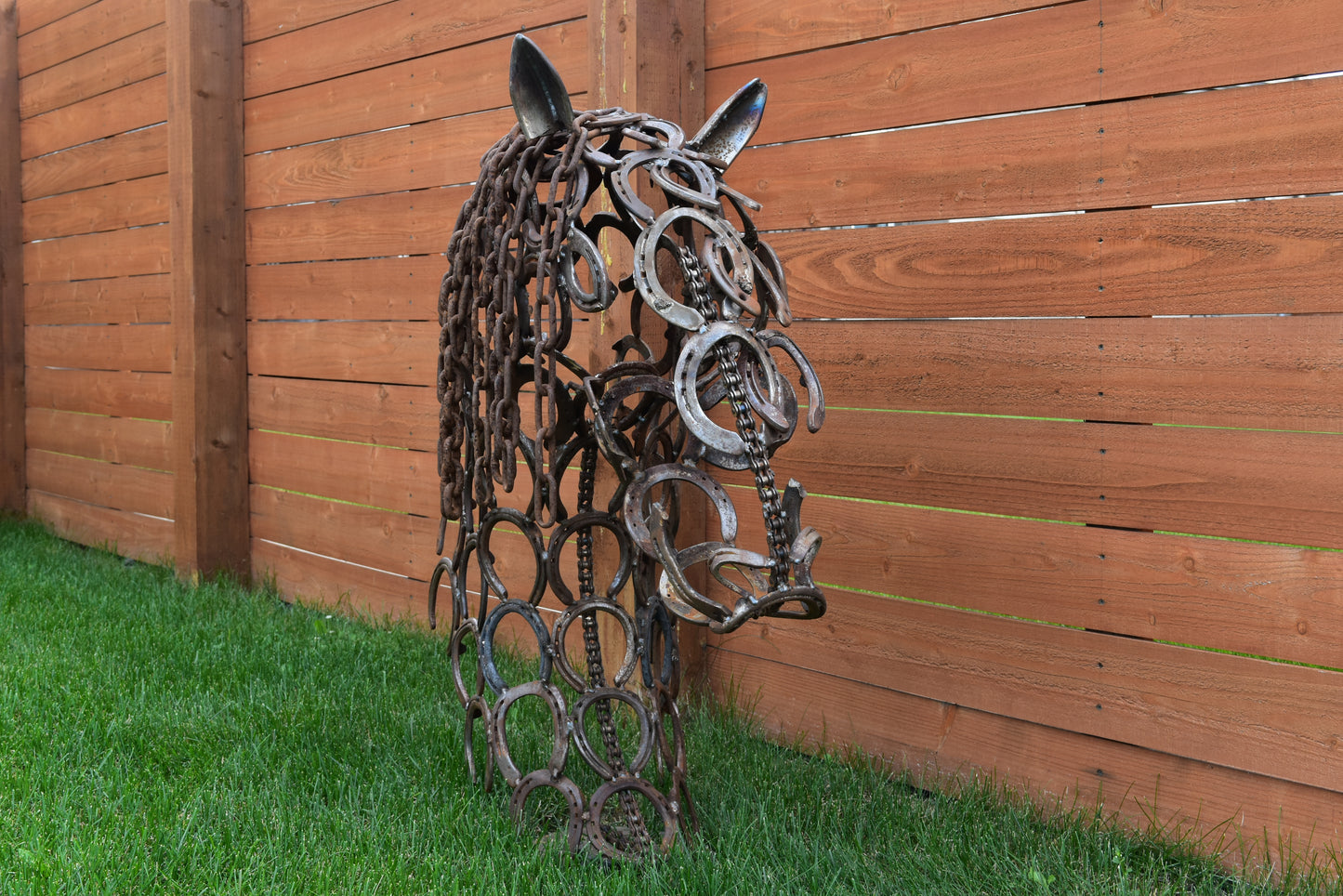 Authentic horseshoes repurposed into a 3D Horse Head Silhouette - Rustic original finish