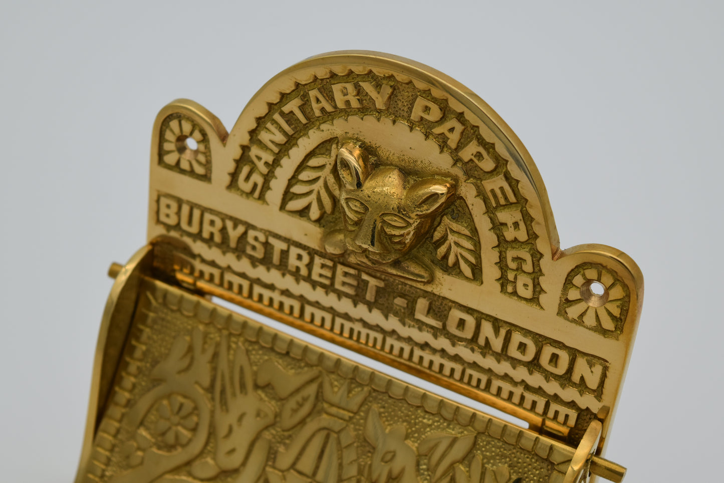The Bury St London Solid Solid brass toilet toll holder Roll size  4.5 " wide X 4.5 " diameter