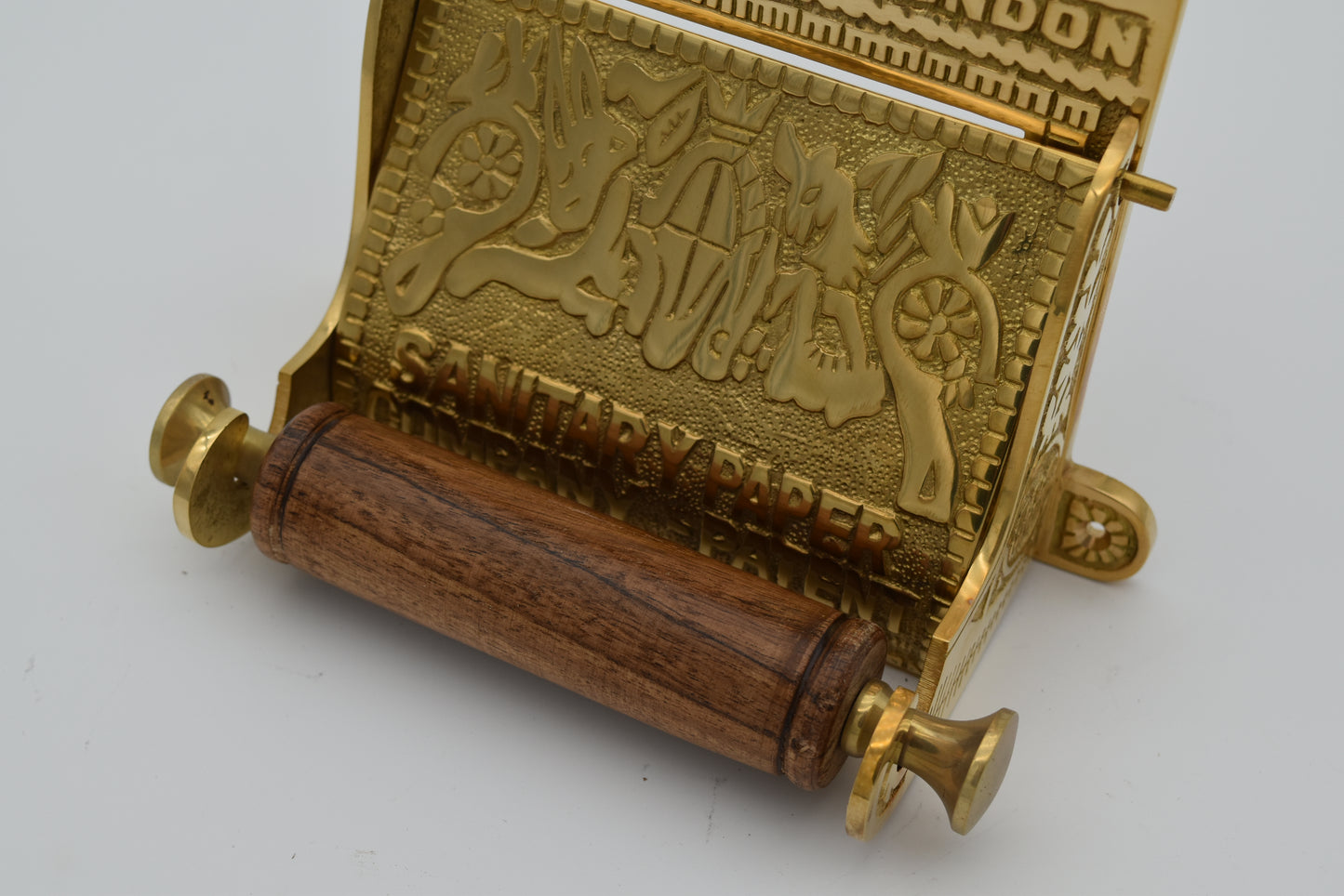 The Bury St London Solid Solid brass toilet toll holder Roll size  4.5 " wide X 4.5 " diameter