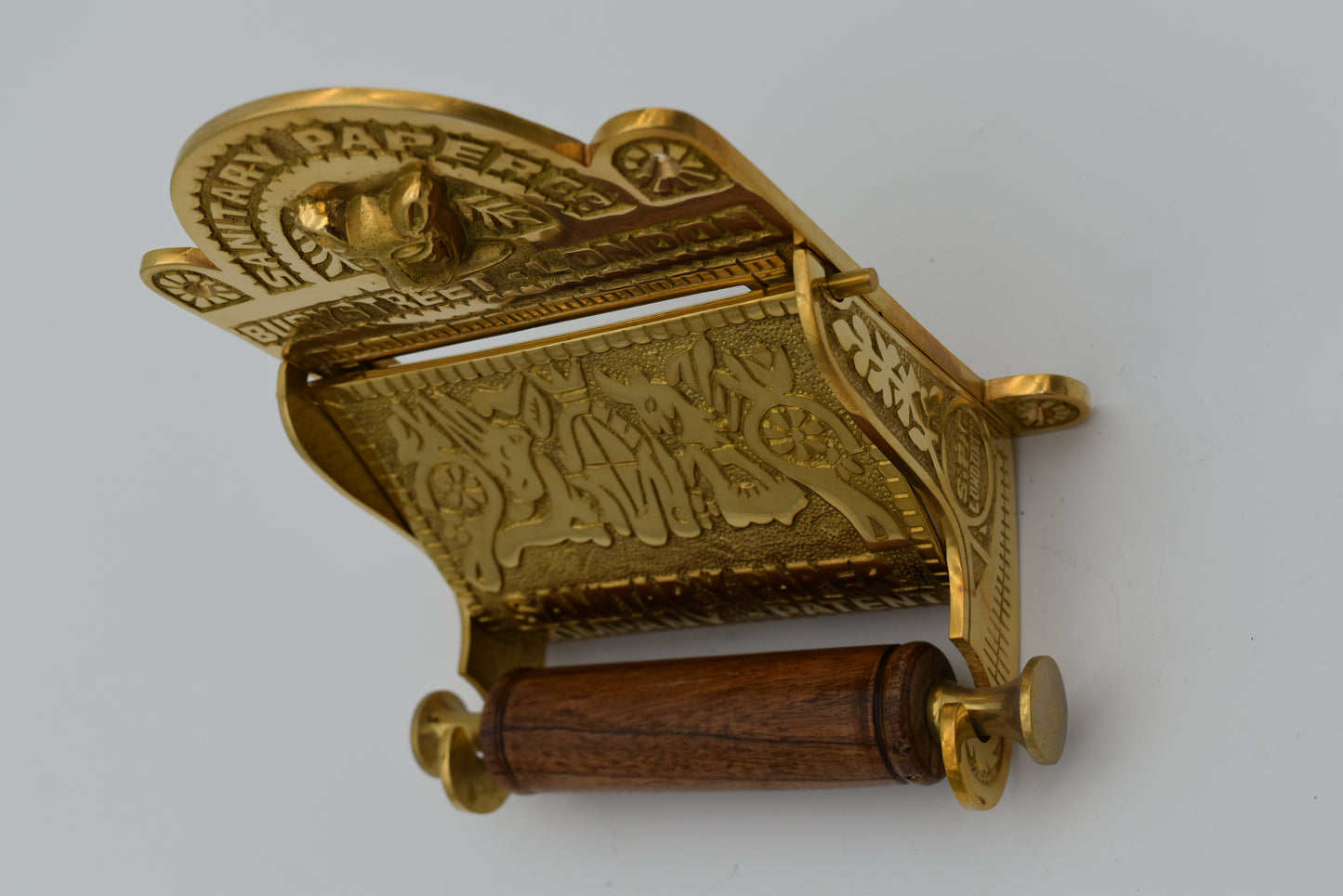 The Bury St London Solid Solid brass toilet toll holder Roll size  4.5 " wide X 4.5 " diameter