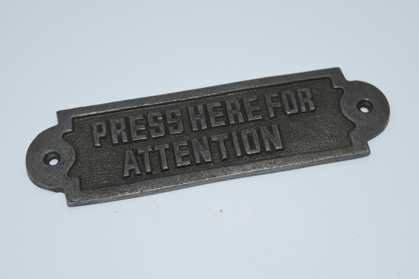 Press Here for Attention