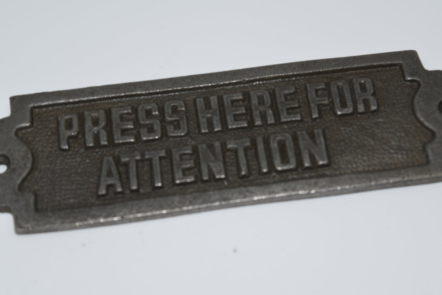 Press Here for Attention
