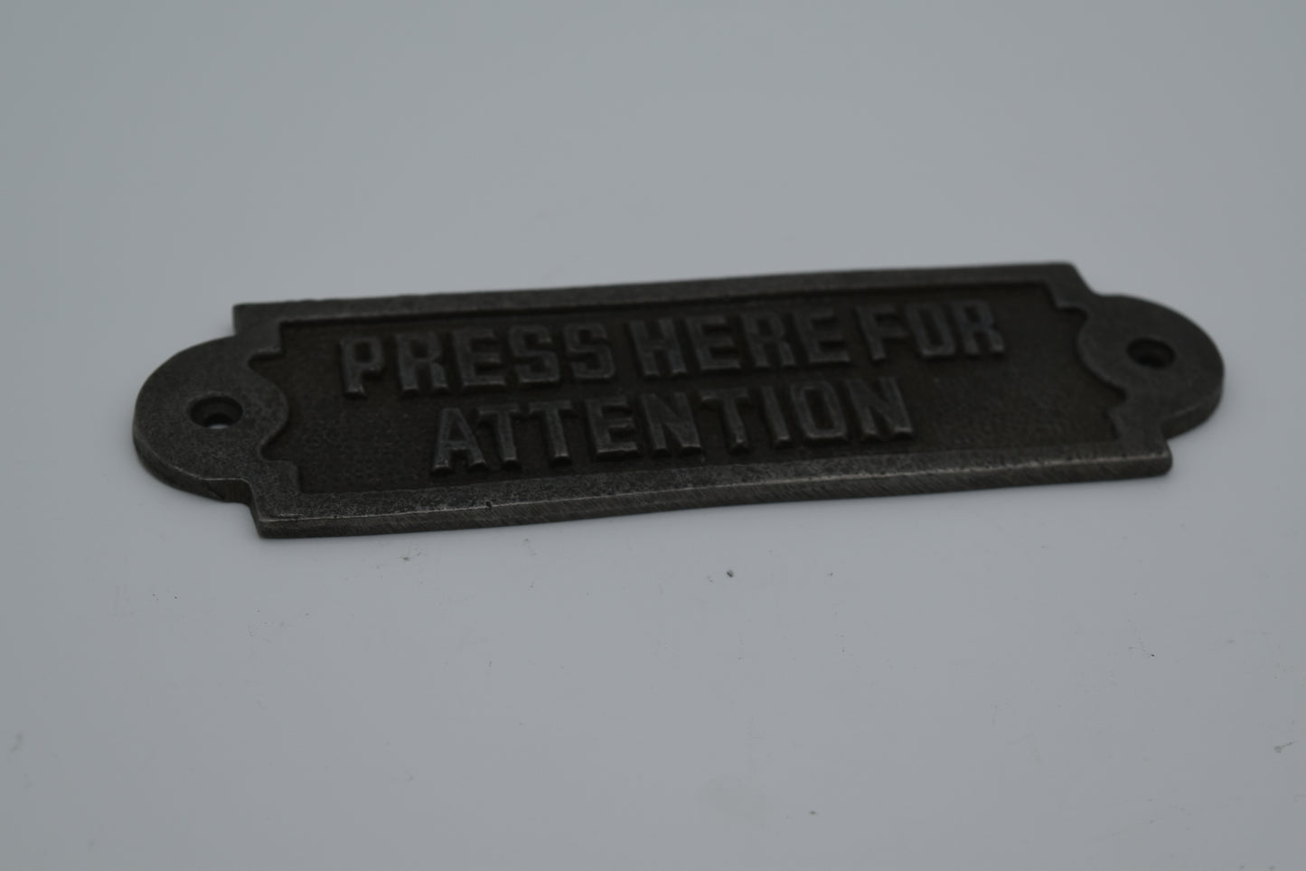 Press Here for Attention