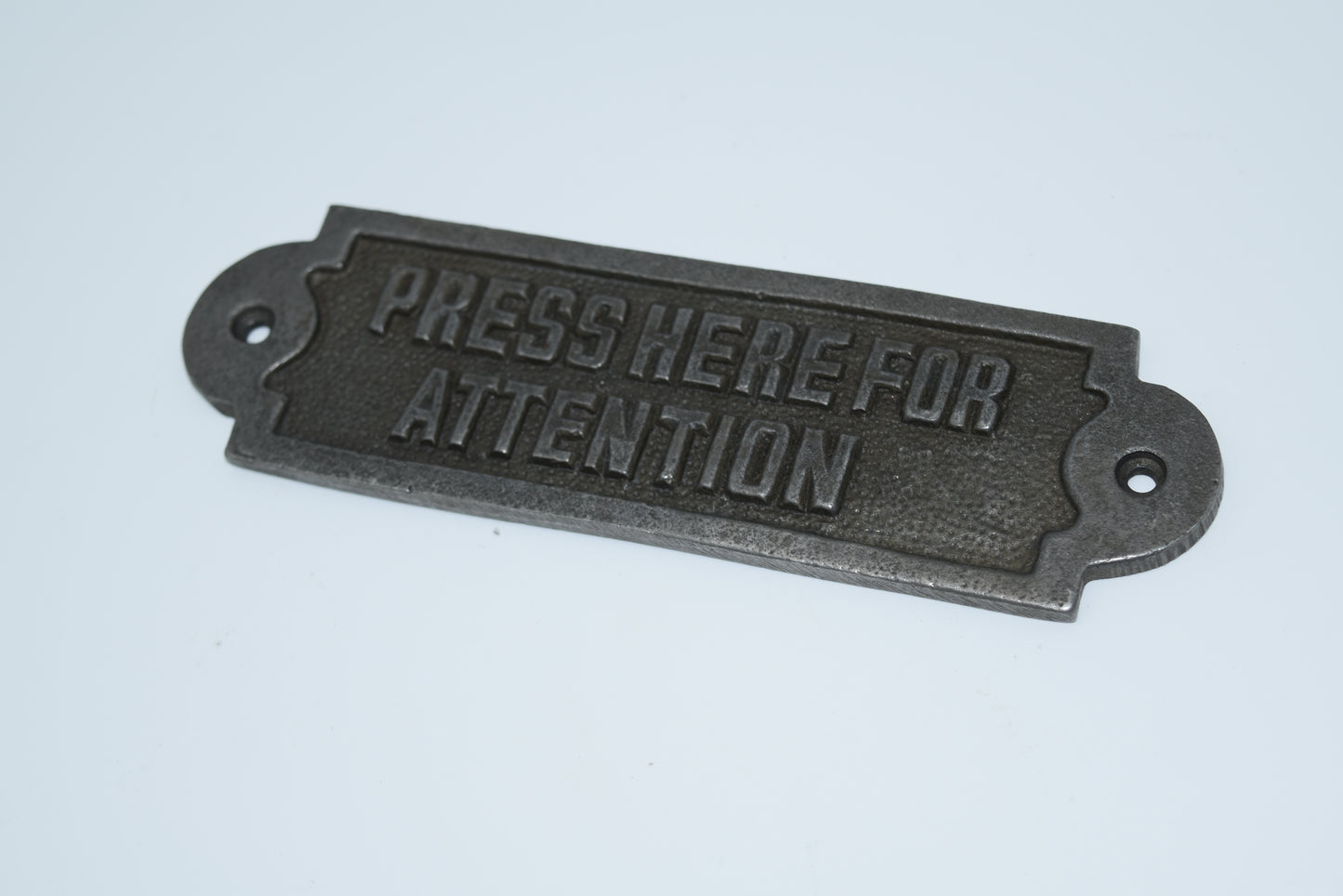 Press Here for Attention