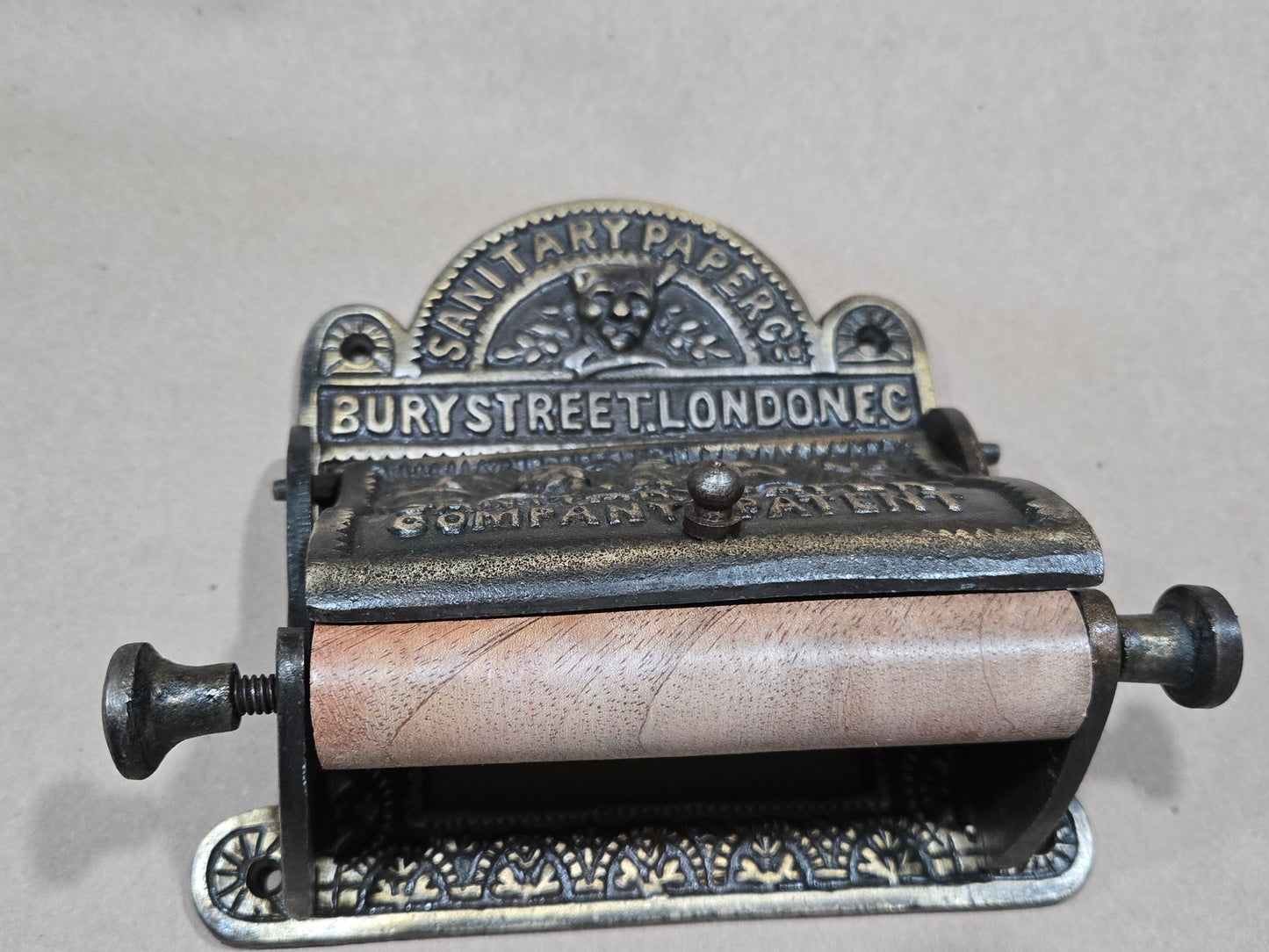 Bury St London cast iron with Antique brass finish toilet toll holder Roll size 4.5 " wide X 4.5 " diameter