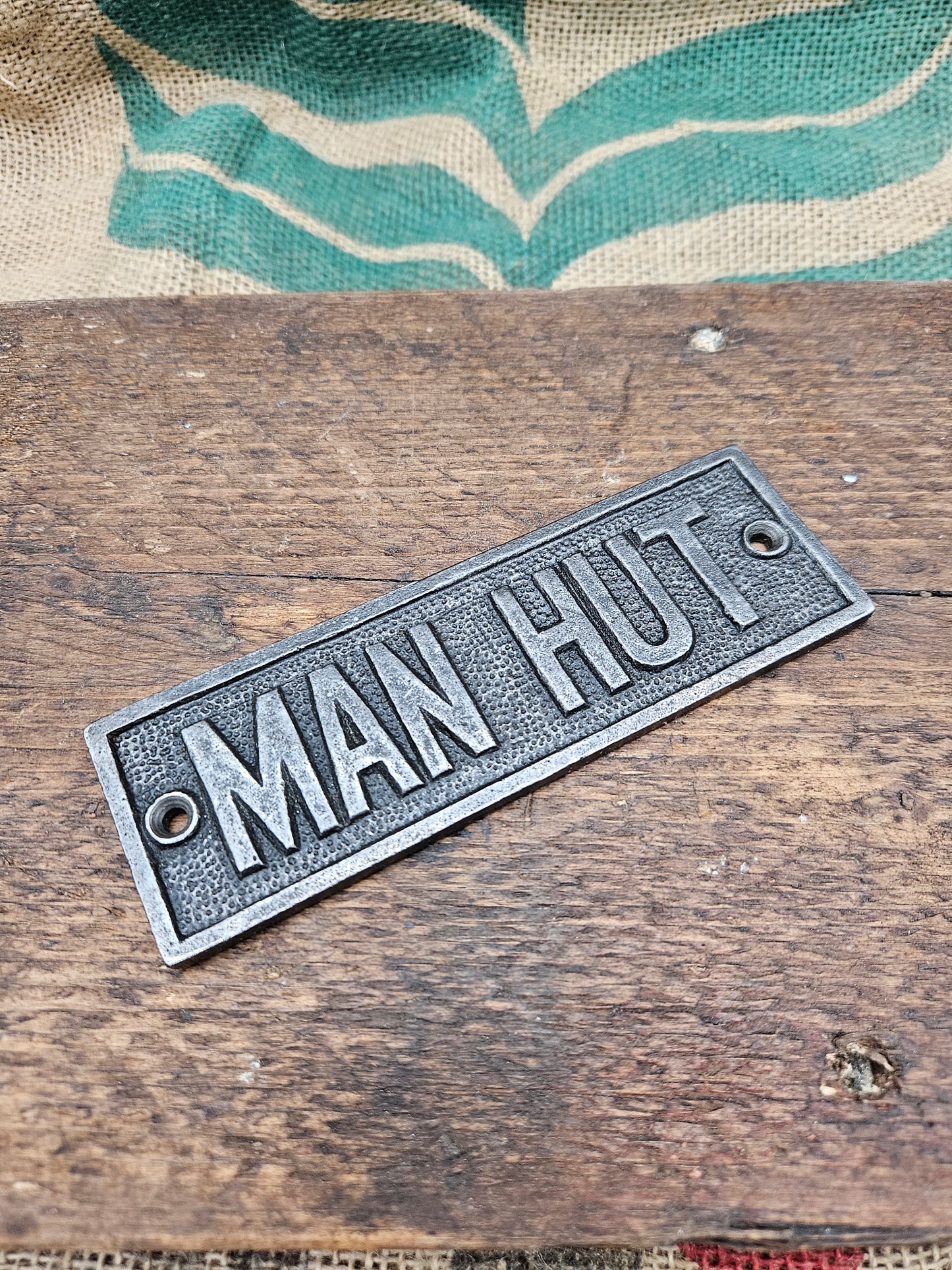 Man Hut Plaque