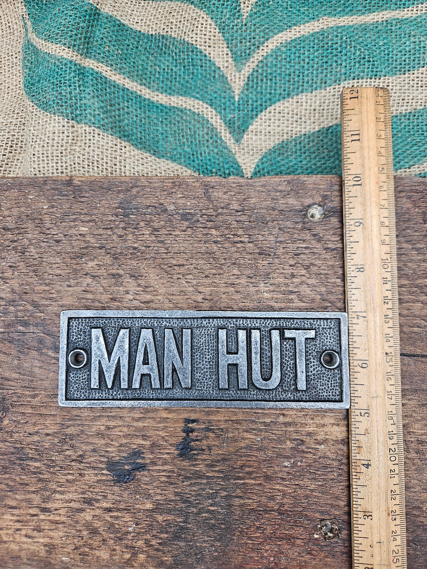 Man Hut Plaque