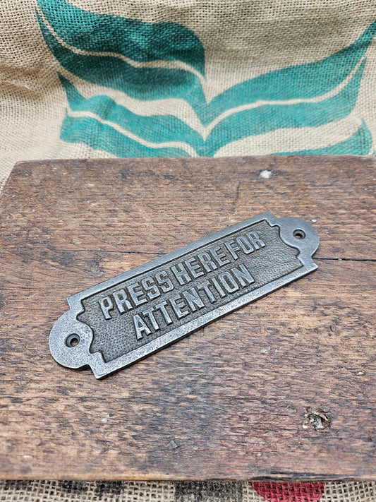 Press Here for Attention