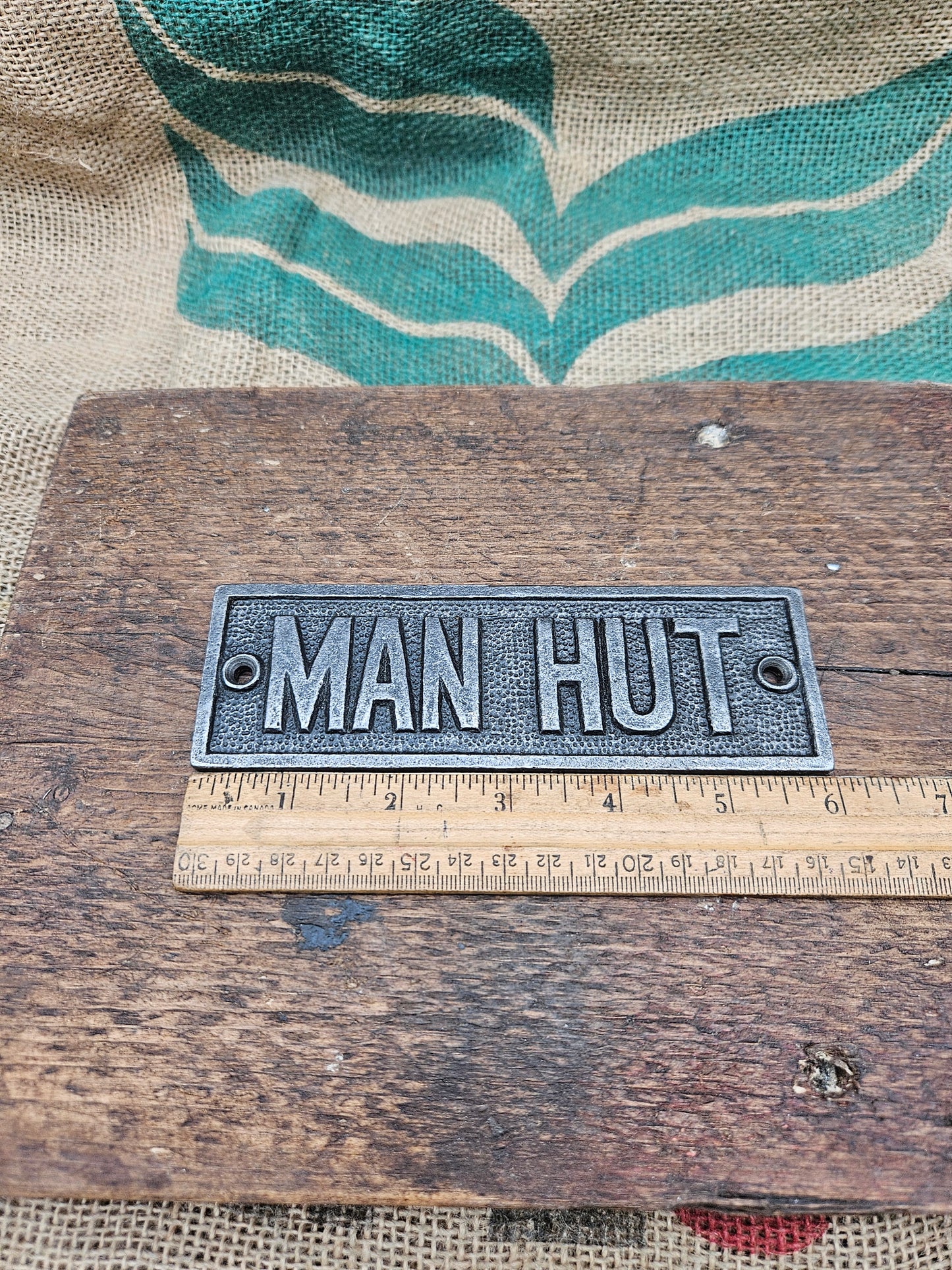 Man Hut Plaque