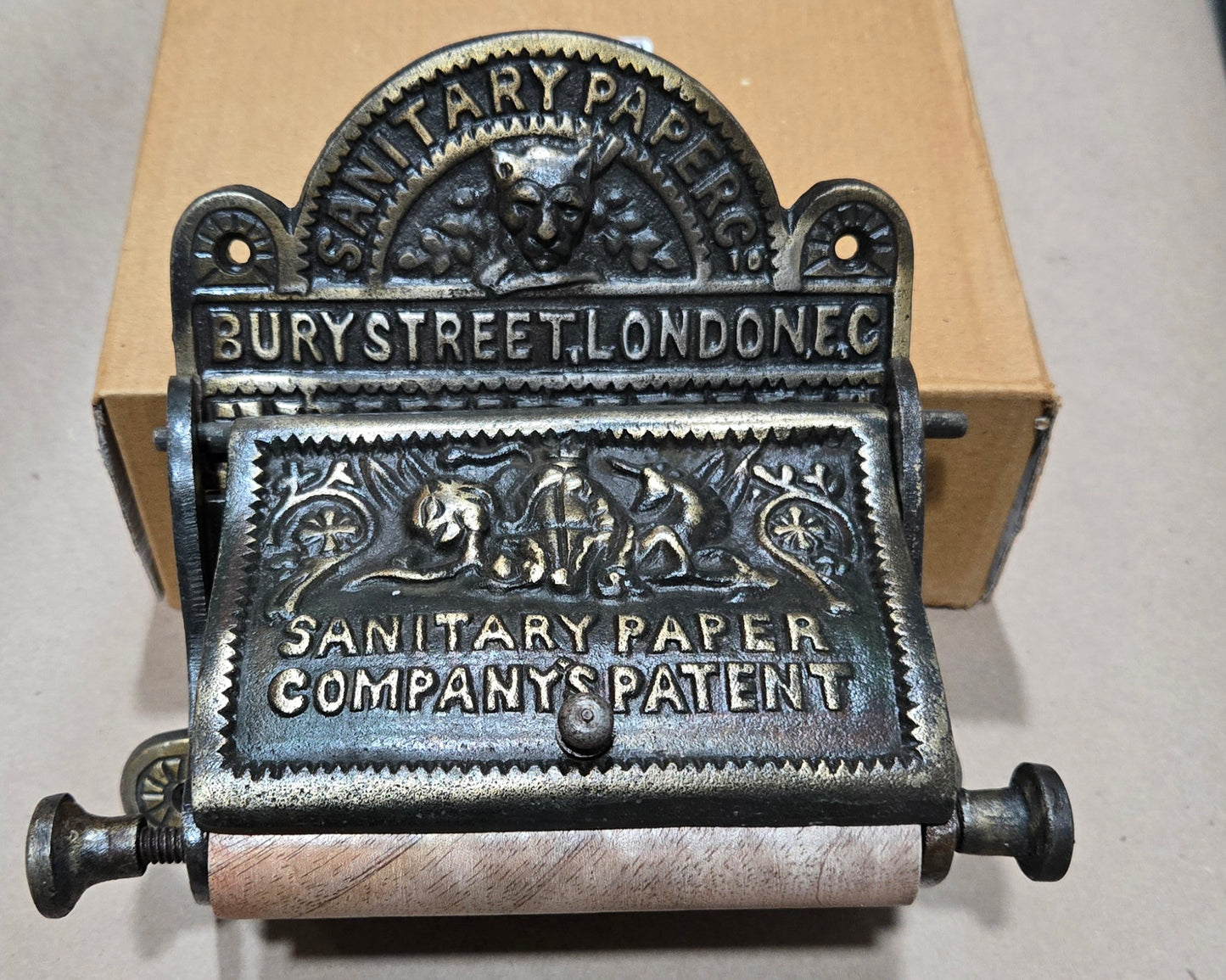 Bury St London cast iron with Antique brass finish toilet toll holder Roll size  4.5 " wide X 4.5 " diameter